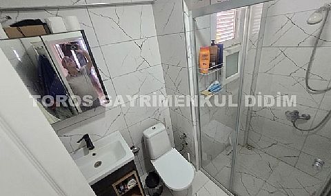 Didim akbükte site içerisinde geniş bahçeli denize yakın konumda satılık yazlık villa