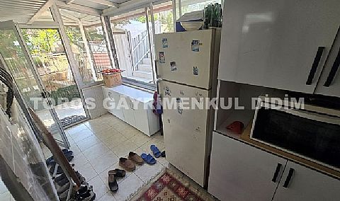 Didim akbükte site içerisinde geniş bahçeli denize yakın konumda satılık yazlık villa