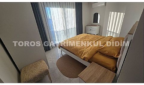 Didim Akbük’te Denize 1,200 m Mesafede Havuzlu Sitede  Satılık Villa