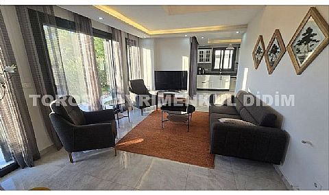 Didim Akbük’te Denize 1,200 m Mesafede Havuzlu Sitede  Satılık Villa