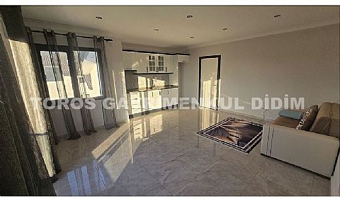 Didim Akbük’te Denize 1,200 m Mesafede Havuzlu Sitede  Satılık Villa