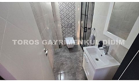 Didim Akbük’te Denize 1,200 m Mesafede Havuzlu Sitede  Satılık Villa