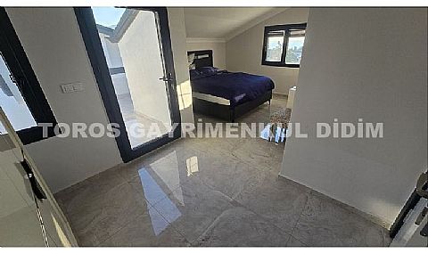 Didim Akbük’te Denize 1,200 m Mesafede Havuzlu Sitede  Satılık Villa