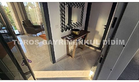 Didim Akbük’te Denize 1,200 m Mesafede Havuzlu Sitede  Satılık Villa