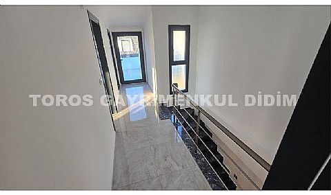 Didim Akbük’te Denize 1,200 m Mesafede Havuzlu Sitede  Satılık Villa