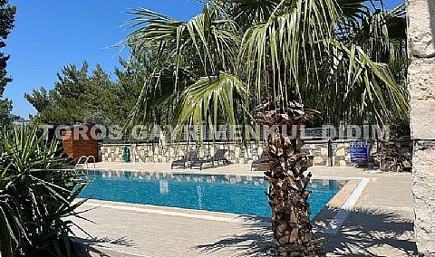 Didim Akbük’te Denize 1,200 m Mesafede Havuzlu Sitede  Satılık Villa