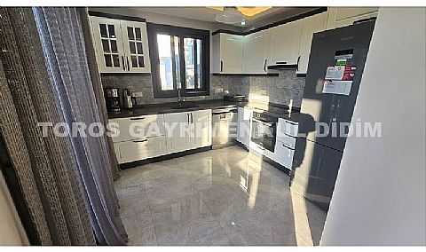 Didim Akbük’te Denize 1,200 m Mesafede Havuzlu Sitede  Satılık Villa