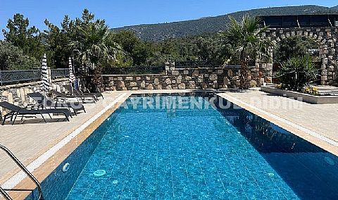 Didim Akbük’te Denize 1,200 m Mesafede Havuzlu Sitede  Satılık Villa
