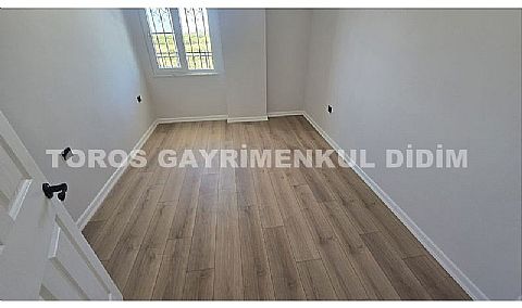 Didim altınkum çamlıkta denize 600 mt mesafede satılık daire