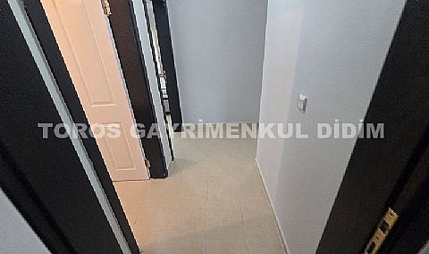 Didim Altınkum havuzlu sitede satılık 3+1  eşyalı geniş bakonlu orta kat daire