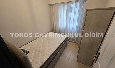 Didim Altınkum havuzlu sitede satılık 3+1  eşyalı geniş bakonlu orta kat daire