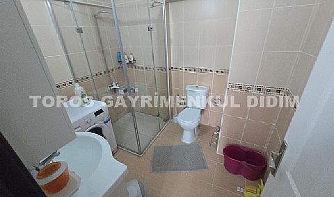 Didim Altınkum havuzlu sitede satılık 3+1  eşyalı geniş bakonlu orta kat daire