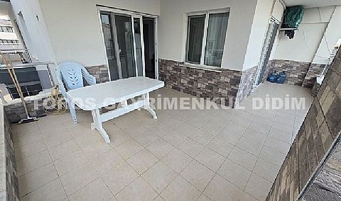 Didim Altınkum havuzlu sitede satılık 3+1  eşyalı geniş bakonlu orta kat daire