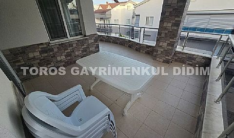 Didim Altınkum havuzlu sitede satılık 3+1  eşyalı geniş bakonlu orta kat daire