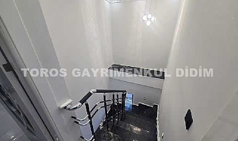 Didim altınkumda havuzlu güvenlikli sitede satılık eşyalı dubleks daire