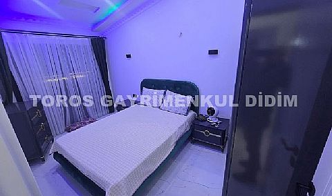 Didim altınkumda havuzlu güvenlikli sitede satılık eşyalı dubleks daire