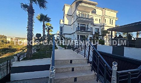 Didim altınkumda havuzlu güvenlikli sitede satılık eşyalı dubleks daire