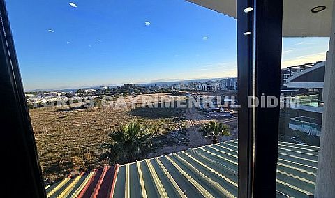 Didim altınkumda havuzlu güvenlikli sitede satılık eşyalı dubleks daire