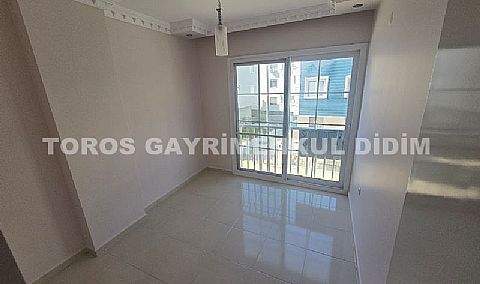 Didim altınkumda plaja 400 mt mesafede satılık 2+1 orta daire