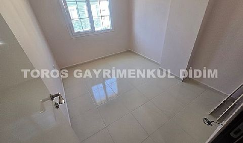 Didim altınkumda plaja 400 mt mesafede satılık 2+1 orta daire