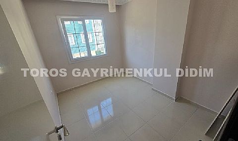 Didim altınkumda plaja 400 mt mesafede satılık 2+1 orta daire