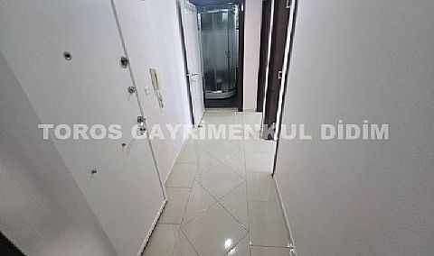 Didim altınkumda plaja 400 mt mesafede satılık 2+1 orta daire