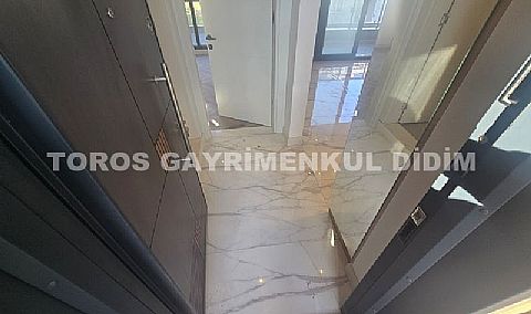 didim çamlıkta denize 400 mt mesafede satılık 1+1 daire