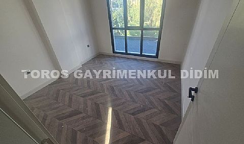 didim çamlıkta denize 400 mt mesafede satılık 1+1 daire
