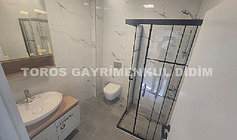 didim çamlıkta denize 400 mt mesafede satılık 1+1 daire