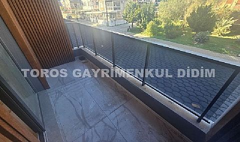 didim çamlıkta denize 400 mt mesafede satılık 1+1 daire