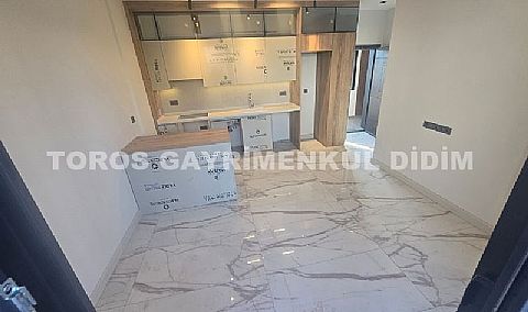 didim çamlıkta denize 400 mt mesafede satılık 1+1 daire