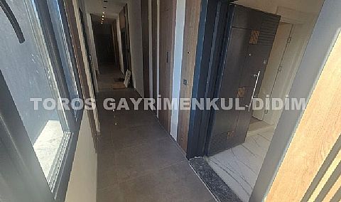 didim çamlıkta denize 400 mt mesafede satılık 1+1 daire