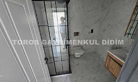 Didim cumhuriyet mahallesinde Asansörlü Binada satılık 2+1 daire 