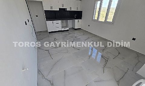 Didim cumhuriyet mahallesinde Asansörlü Binada satılık 2+1 daire 