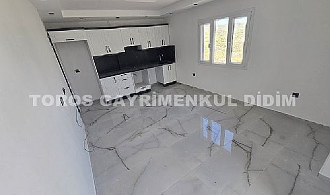 Didim cumhuriyet mahallesinde Asansörlü Binada satılık 2+1 daire 