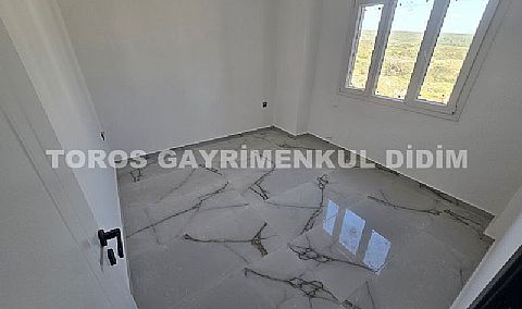 Didim cumhuriyet mahallesinde Asansörlü Binada satılık 2+1 daire 