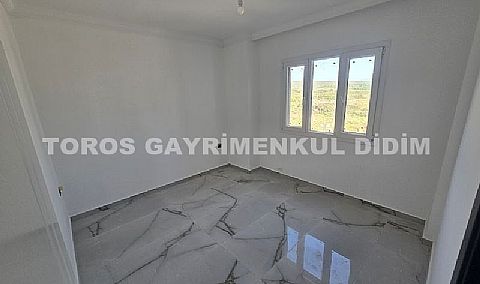 Didim cumhuriyet mahallesinde Asansörlü Binada satılık 2+1 daire 