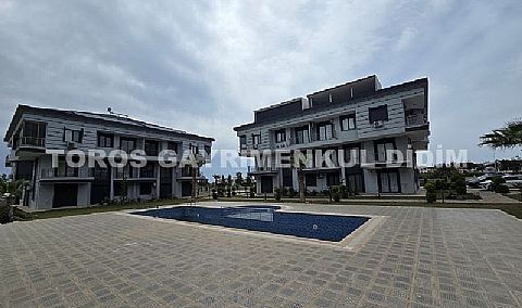 Didim cumhuriyet mahallesinde havuzlu sitede satılık orta kat daire