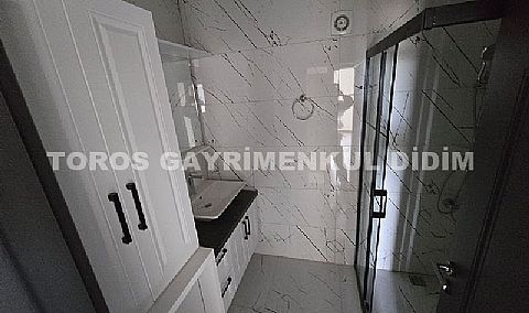 Didim cumhuriyet mahallesinde havuzlu sitede satılık orta kat daire