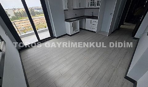 Didim cumhuriyet mahallesinde havuzlu sitede satılık orta kat daire