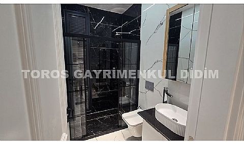 DİDİM DE SATILIK ULTRA LÜKS 5+1 EĞLENCE SALONLU VİLLA HAMAM SAUNA JAKUZİ SONSUZ HAVUZ DENİZ MANZARLI