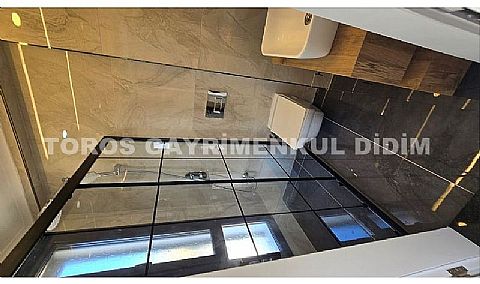 Didim Efeler de havuzlu otoparklı 4+1 ayrı mutfaklı satılık villa  giriş katında da yatak odası var