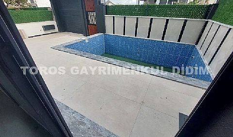 Didim Efeler'de 4+1 Ayrı Mutfaklı, Giyinme Odalı Havuzlu Otoparklı Villa