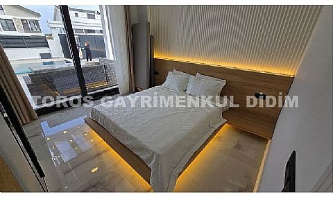 Didim efelerde 500m2 arsa üzerine kurulu satılık 5+1 sıfır eşyalı villa