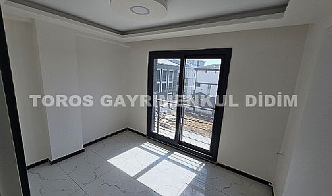 Didim efelerde asansörlü binada satılık 3+1 apartman dubleksi
