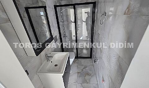 Didim efelerde asansörlü binada satılık 3+1 apartman dubleksi