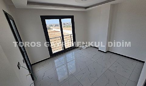 Didim efelerde asansörlü binada satılık 3+1 apartman dubleksi