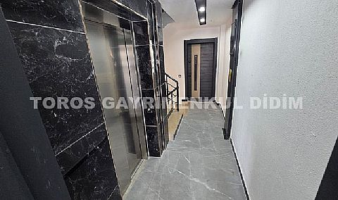 Didim efelerde asansörlü binada satılık 3+1 apartman dubleksi