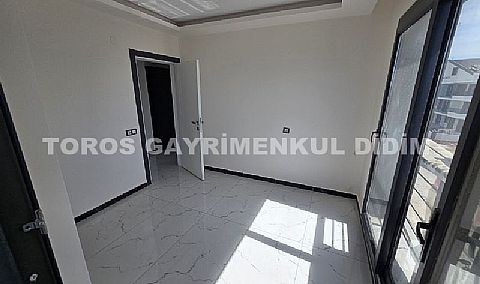 Didim efelerde asansörlü binada satılık 3+1 apartman dubleksi