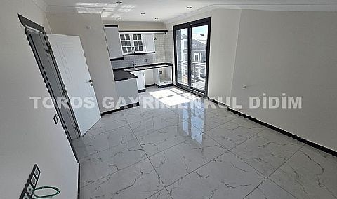 Didim efelerde asansörlü binada satılık 3+1 apartman dubleksi